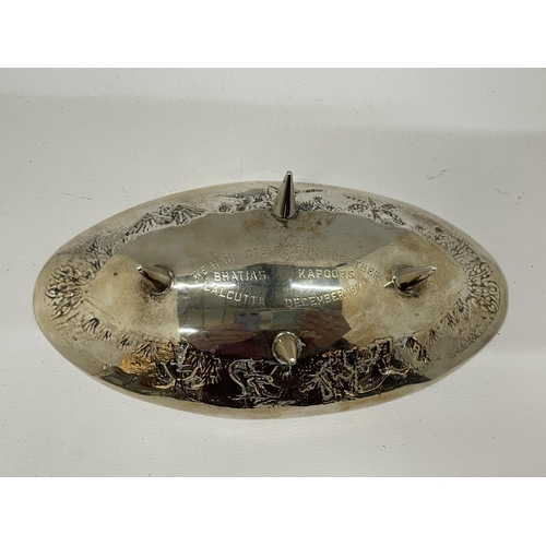 2 - AN ABSTRACT STERLING SILVER OVAL DISH ON NEEDLE FEET, STAMPED TO REVERSE AND DATED CALCUTTA, DECEMBE... 