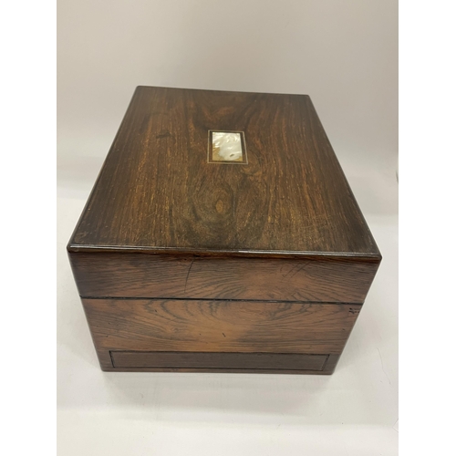 3 - A VICTORIAN ROSEWOOD JEWELLERY BOX WITH MOTHER OF PEARL DESIGN & RED SILK INTERIOR AND SECRET SIDE D... 