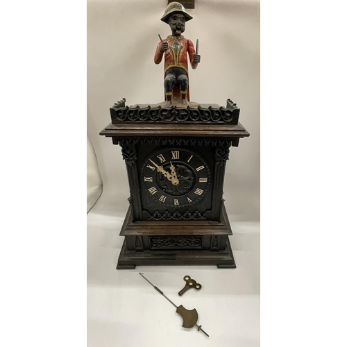 4 - AN EARLY 20TH CENTURY NOVELTY AUTOMATION CARVED DARK OAK MANTLE CLOCK WITH NAPOLEONIC MONKEY FIGURE ... 