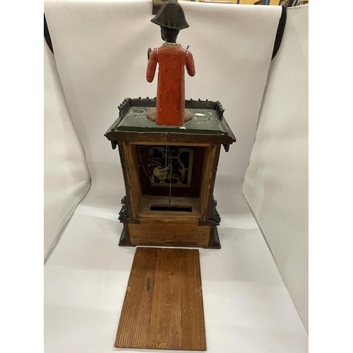 4 - AN EARLY 20TH CENTURY NOVELTY AUTOMATION CARVED DARK OAK MANTLE CLOCK WITH NAPOLEONIC MONKEY FIGURE ... 