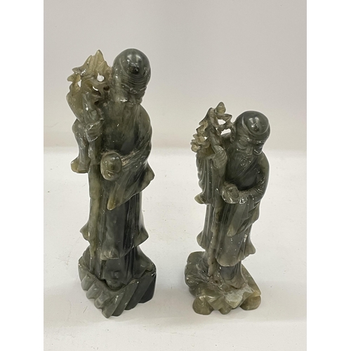 49 - TWO JADE TYPE STONEWARE IMMORTALS FIGURES, HEIGHT OF LARGEST 18.5CM