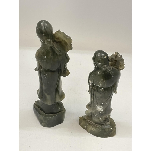 49 - TWO JADE TYPE STONEWARE IMMORTALS FIGURES, HEIGHT OF LARGEST 18.5CM