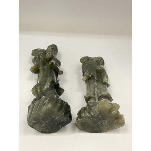 49 - TWO JADE TYPE STONEWARE IMMORTALS FIGURES, HEIGHT OF LARGEST 18.5CM