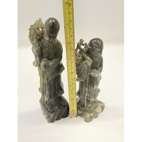 49 - TWO JADE TYPE STONEWARE IMMORTALS FIGURES, HEIGHT OF LARGEST 18.5CM