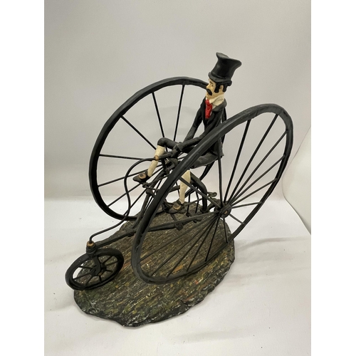 50 - A NOVELTY TWIN PENNY FARTHING FIGURE, HEIGHT 32CM