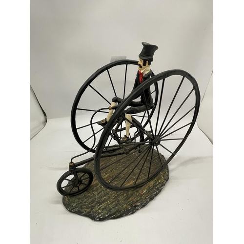 50 - A NOVELTY TWIN PENNY FARTHING FIGURE, HEIGHT 32CM