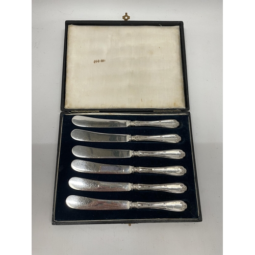 52 - A CASED SET OF SIX CASED HALLMARKED SILVER HANDLED BUTTER KNIVES