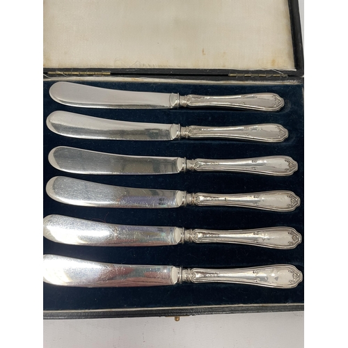 52 - A CASED SET OF SIX CASED HALLMARKED SILVER HANDLED BUTTER KNIVES