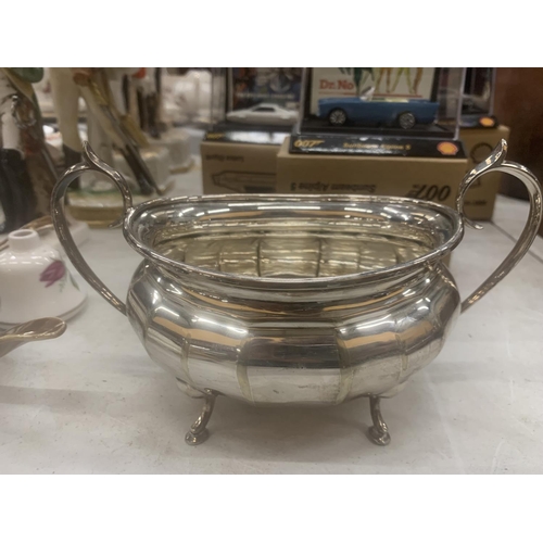 147 - A SILVER PLATED CREAM JUG AND SUGAR BOWL