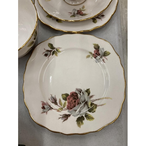 153 - A ROYAL VALE TEASET WITH ROSE DECORATION TO INCLUDE A CAKE PLATE, CUPS, SAUCERS, SIDE PLATES, CREAM ... 