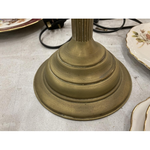 157 - A VINTAGE BRASS OIL LAMP WITH OPAQUE SHADE