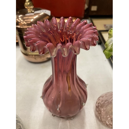 193 - FOUR PIECES OF COLOURED ART GLASSWARE TO INCLUDE THREE VASES AND A HANDLED BASKET BOWL