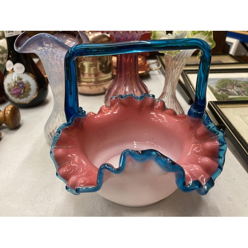 193 - FOUR PIECES OF COLOURED ART GLASSWARE TO INCLUDE THREE VASES AND A HANDLED BASKET BOWL