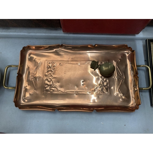 194 - A COPPER ARTS AND CRAFTS/ART NOUVEAU TRAY AND A COPPER TEA CADDY