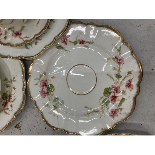 218 - AN ANTIQUE DIAMOND CHINA TEASET TO INCLUDE A LARGE NUMBER OF TRIOS, TWO CAKE PLATES, A CREAM JUG AND... 