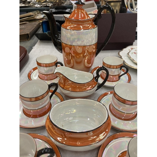 220 - A VINTAGE STYLE ORANGE, CREAM AND BLACK LUSTRE COFFEE SET TO INCLUDE A COFFEE POT, CREAM JUG, SUGAR ... 