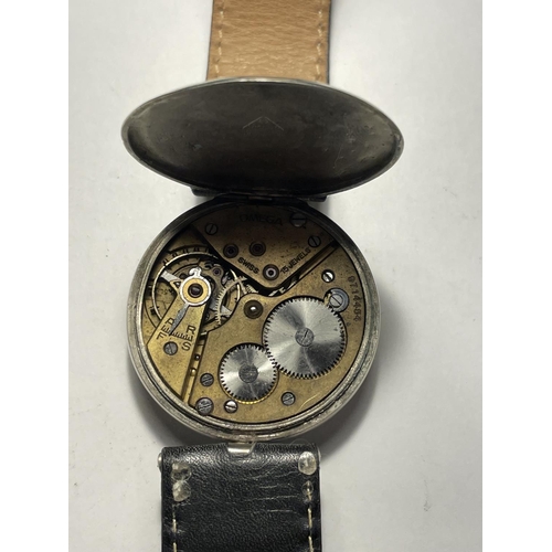 541 - AN OMEGA 1920'S WRIST WATCH WITH OVER SIZED TICKING