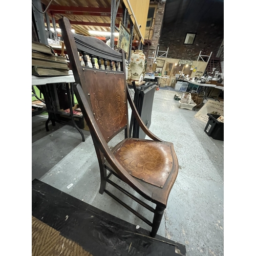 100 - AN ART NOUVEAU CHAIR WITH FLORAL DESIGN SEAT AND BACK