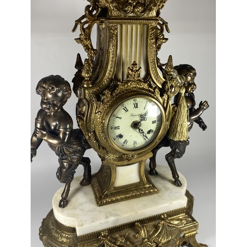 61 - A C.1900 ITALIAN REPRODUCTION MANTLE CLOCK BY IMPERIAL IN BRASS WITH MARBLE BASE AND CHERUBS, HEIGHT... 