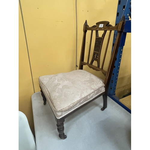 83 - AN EDWARDIAN INLAID BEDROOM CHAIR ON CASTORS