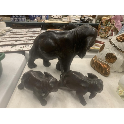 256 - A SET OF THREE VINTAGE SPELTER/LEAD ELEPHANT MODELS, HEIGHT 19CM