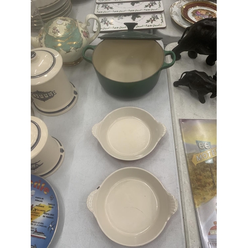 257 - THREE LE CREUSET ITEMS TO INCLUDE A CASSEROLE DISH AND TWO PIE DISHES