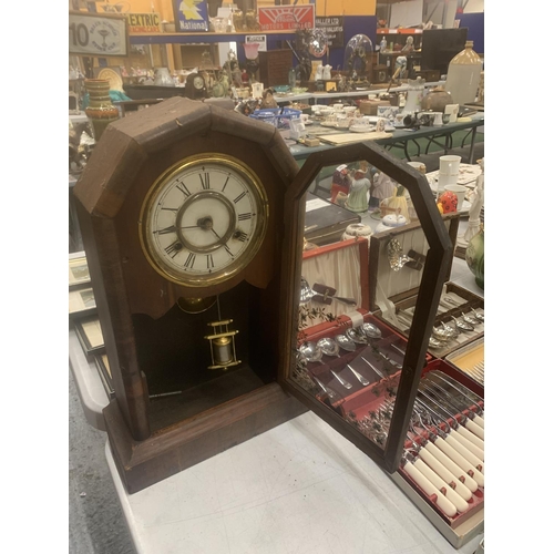 261 - A VINTAGE MAHOGANY CASED MANTLE CLOCK WITH FLORAL DECORATED GLASS DOOR, TO INCLUDE PENDULUM AND KEY ... 