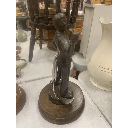 273 - A SPELTER FIGURE OF A DARTS PLAYER HEIGHT 22CM