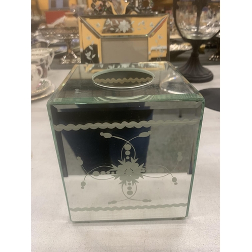 293 - A MODERN TABLE TOP MIRROR WITH CRYSTAL DECORATION, TWO MIRRORED PHOTO FRAMES AND A TISSUE BOX HOLDER