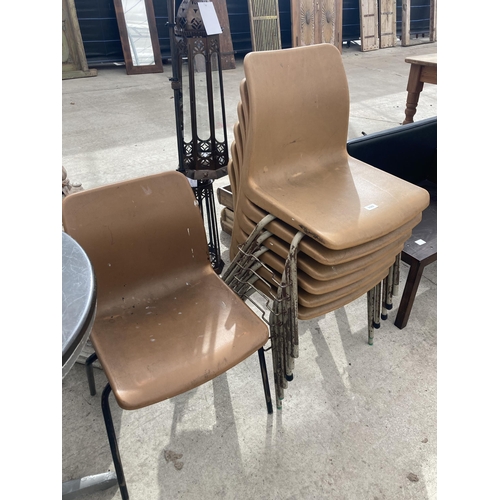 3582 - SEVEN BROWN PLASTIC STACKING CHAIRS