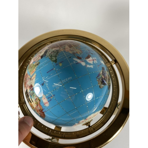 65 - A DESK TOP TURQUOISE GEMSTONE WORLD GLOBE ON BRASS BASE