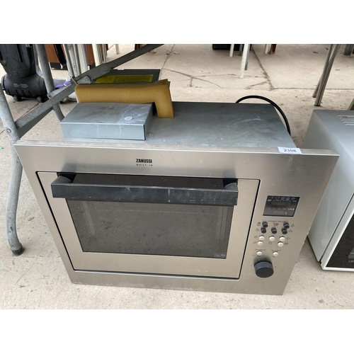 2398 - A SILVER ZANUSSI BUILT IN MICROWAVE