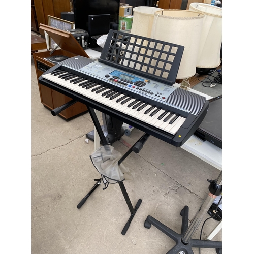 2402 - A YAMAHA ELECTRIC KEYBOARD AND STAND