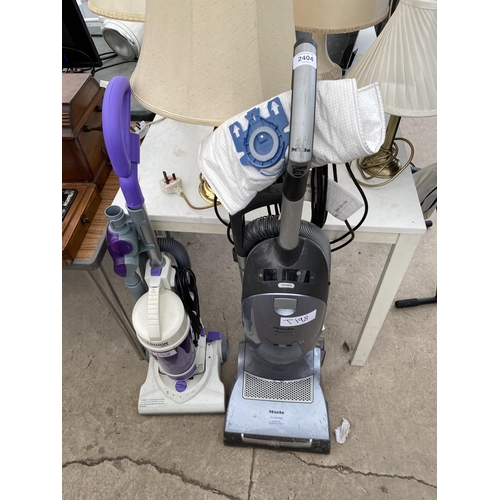 2404 - TWO VACUUM CLEANERS TO INCLUDE A MIELE