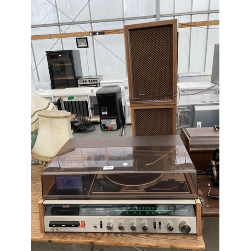 2409 - A SONY STEREO MUSIC SYSTEM RECORD DECK AND TWO WOODEN CASED SONY SPEAKERS