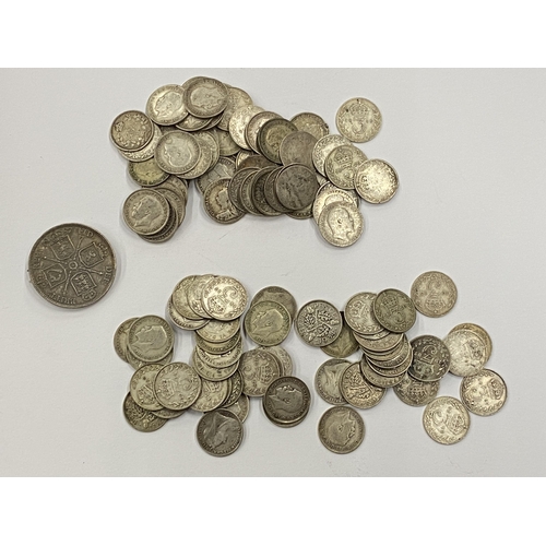 373 - A LEATHER WALLET OF MAINLY PRE 1920 SILVER THREEPENCES AND A VICTORIAN 1887 COIN BROOCH