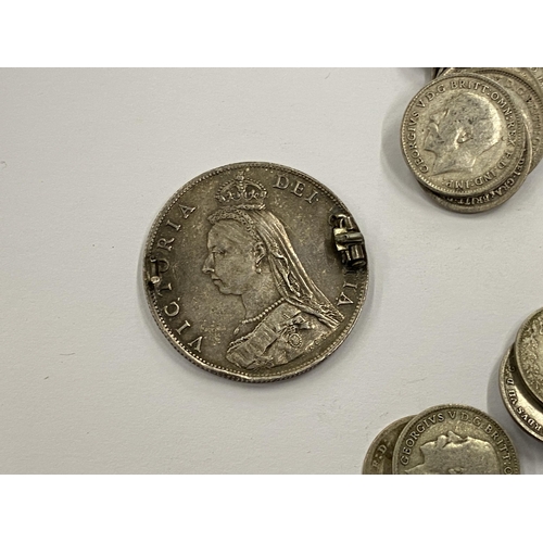 373 - A LEATHER WALLET OF MAINLY PRE 1920 SILVER THREEPENCES AND A VICTORIAN 1887 COIN BROOCH