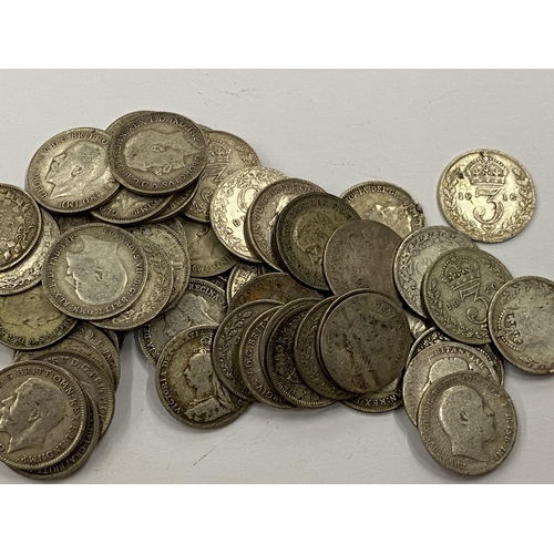 373 - A LEATHER WALLET OF MAINLY PRE 1920 SILVER THREEPENCES AND A VICTORIAN 1887 COIN BROOCH