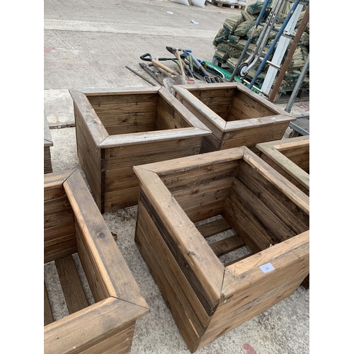 48 - TWO LARGE SQUARE WOODEN PLANTERS HEIGHT 46CM, WIDTH 57CM, DEPTH 57CM - NO VAT