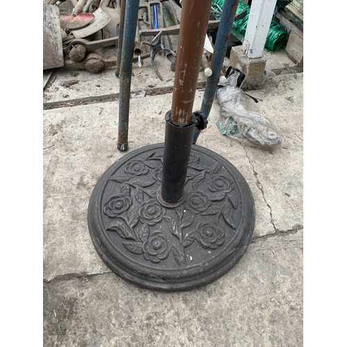 50 - A DECORATIVE METAL PARASOL BASE AND PARASOL NO VAT