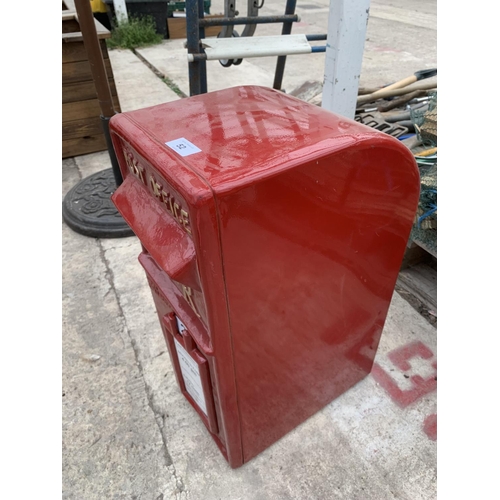 52 - A RED POST BOX WITH KEYS + VAT