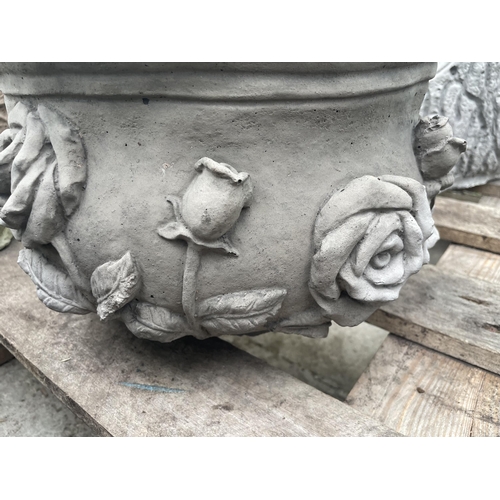 122 - A  CONCRETE ROSE DESIGN PLANTER WITH PRIMULAS  AND BELLIS DAISYS NO VAT