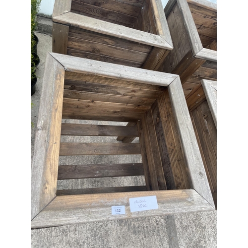 132 - TWO LARGE WOODEN PLANTERS ON LEGS NO VAT