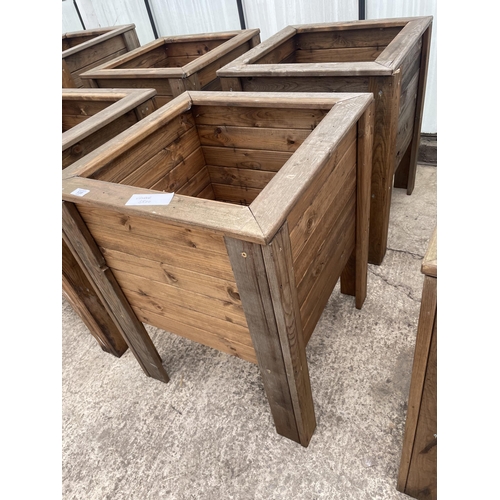 135 - TWO LARGE WOODEN PLANTERS ON LEGS NO VAT