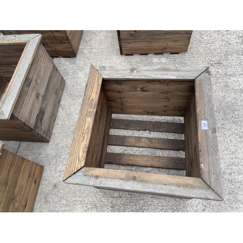 139 - THREE LARGE WOODEN PLANTERS HEIGHT 46CM, WIDTH 57CM, DEPTH 57CM - NO VAT