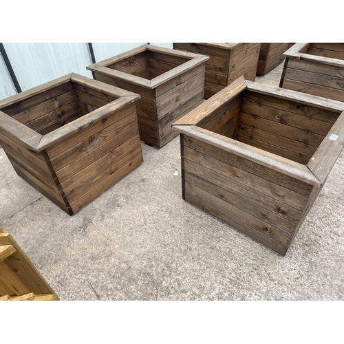 139 - THREE LARGE WOODEN PLANTERS HEIGHT 46CM, WIDTH 57CM, DEPTH 57CM - NO VAT