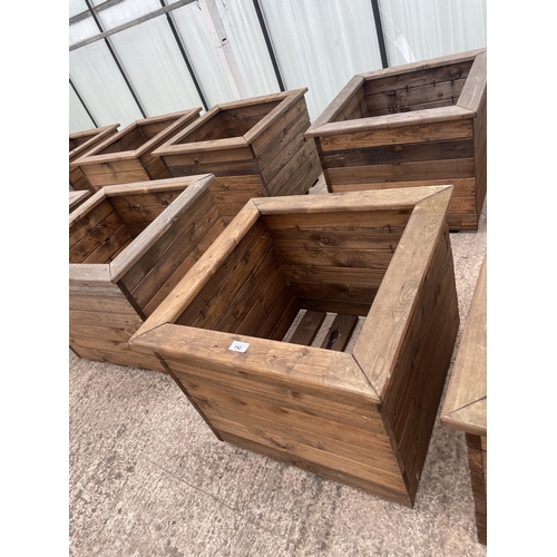 142 - TWO LARGE WOODEN PLANTERS HEIGHT 46CM, WIDTH 57CM, DEPTH 57CM - NO VAT