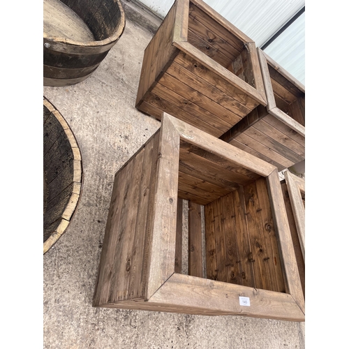 145 - TWO LARGE WOODEN PLANTERS HEIGHT 46CM, WIDTH 57CM, DEPTH 57CM - NO VAT