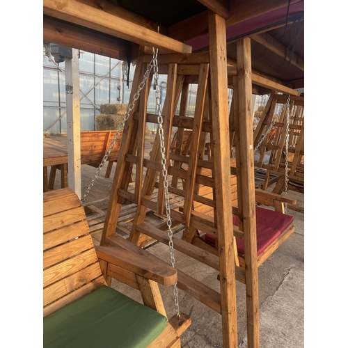 262 - AN AS, NEW EX DISPLAY CHARLES TAYLOR SWING SEAT WITH TRELLIS SIDES, SEAT COVER AND CANOPY + VAT