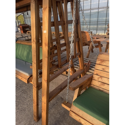 262 - AN AS, NEW EX DISPLAY CHARLES TAYLOR SWING SEAT WITH TRELLIS SIDES, SEAT COVER AND CANOPY + VAT